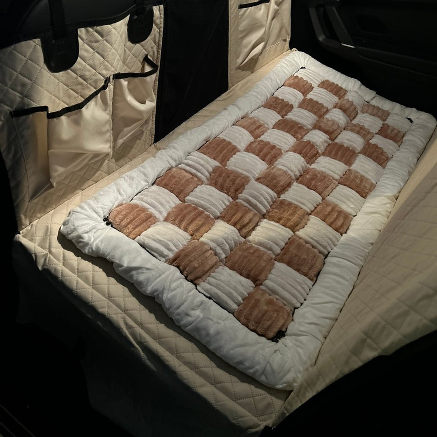 Beige Team K9 plush bed on a Beige hard bottom seat cover