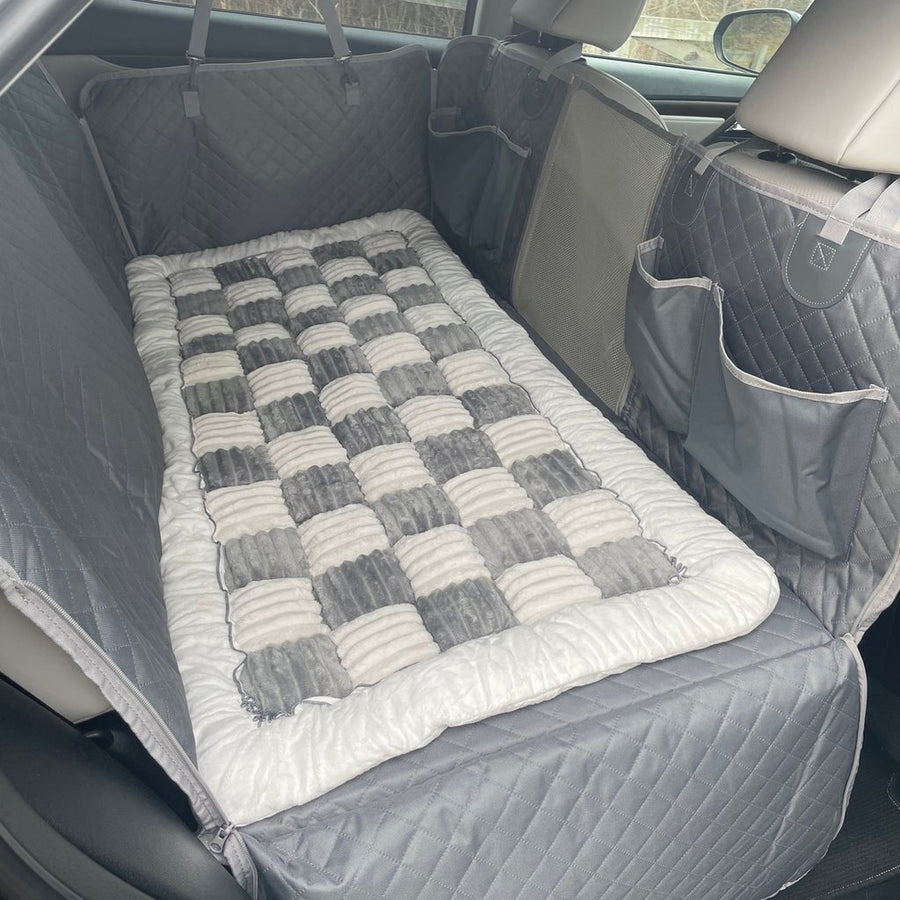 Gray Team K9 plush bed on a Gray hard bottom seat cover in a Lexus RX