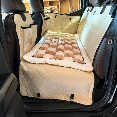 Customer photo from Sherry S.: a Beige Team K9 seat cover with the plush bed in her Toyota Tacoma