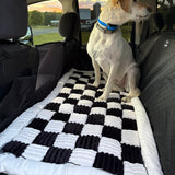 Customer photo from Rich M.: his dog Madison on the plush bed on a Black Team K9 seat cover
