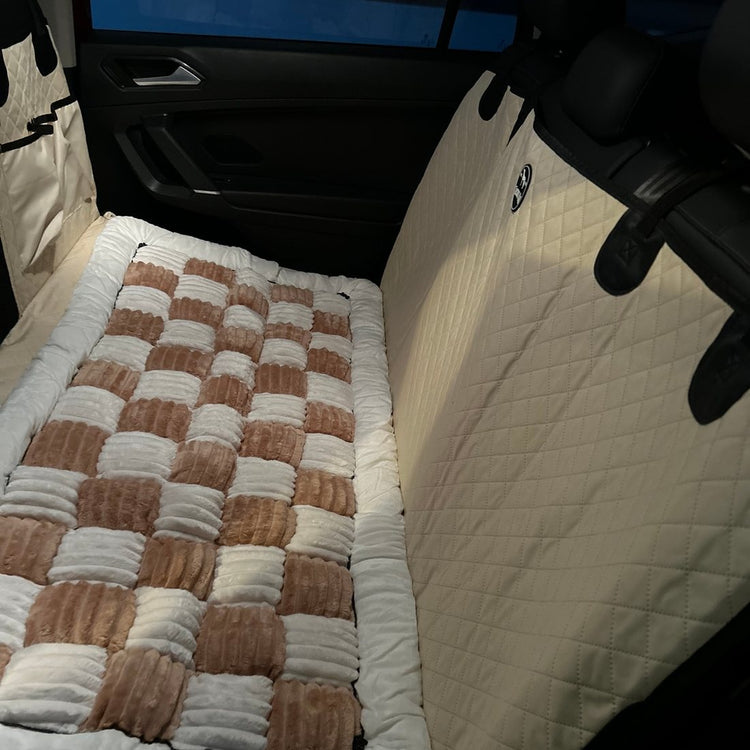Customer photo from Byron H.: a Beige Team K9 seat cover with its side flaps over the doors
