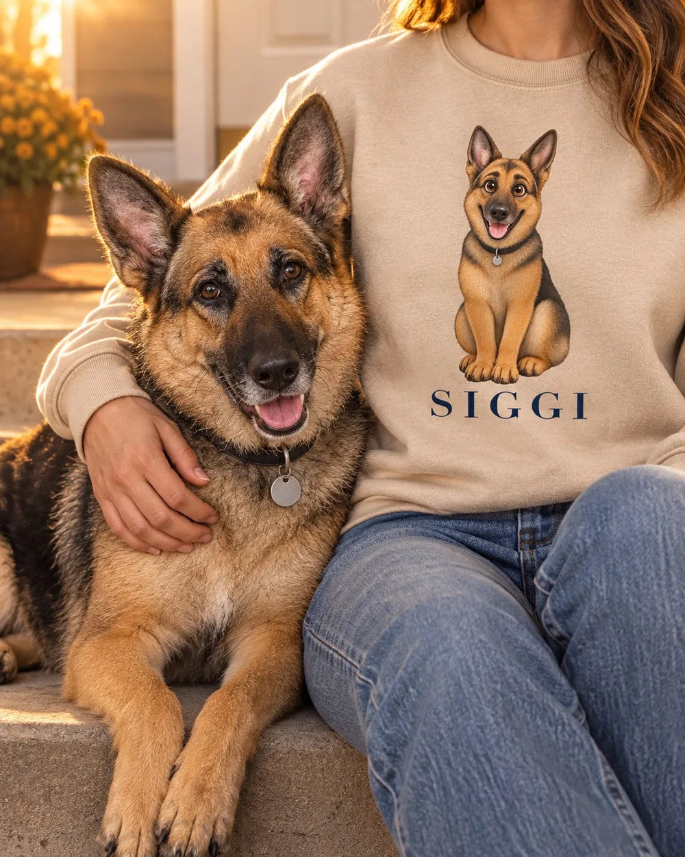 Siggi leaning on someone wearing a sweatshirt with her picture and name