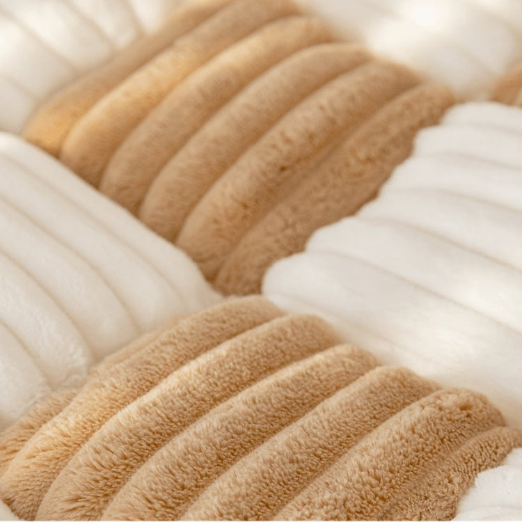 Close view of the thick, plush padding of a Team K9 couch cover