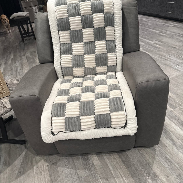 A customer's Gray Team K9 cover on an armchair